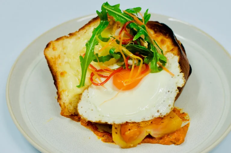 Croque monsieur on brioche with a fried egg (croque madame)