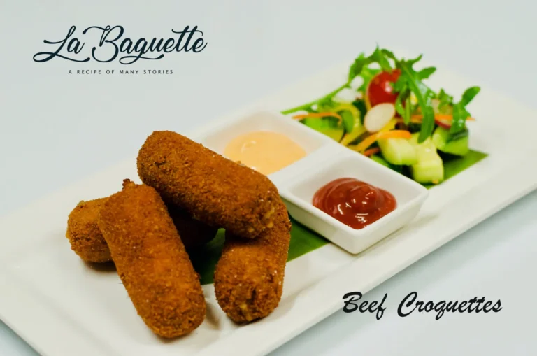 Dutch beef croquettes with dipping sauces and side salad