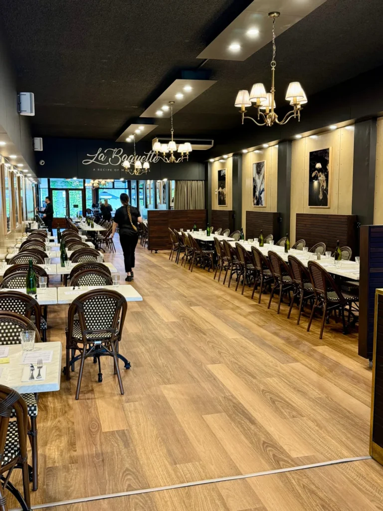 La Baguette dining room set with long tables for a function, Berwick Village