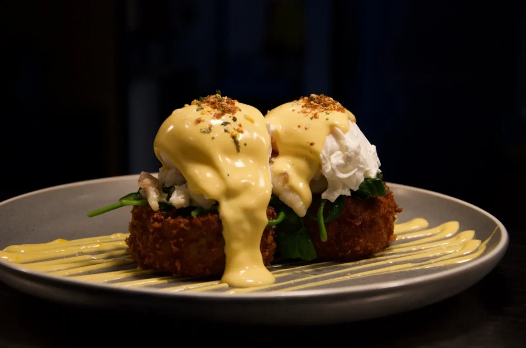 Lobster Benedict with poached eggs and hollandaise on crispy potato cake at La Baguette Berwick