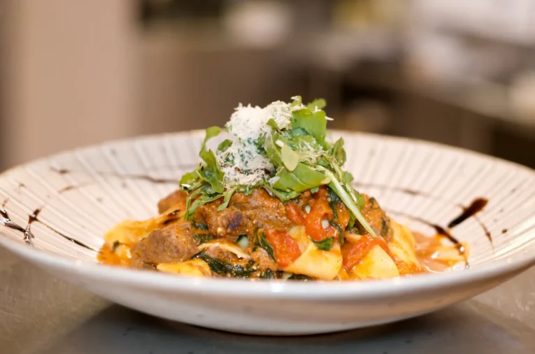 Pappardelle with slow-braised beef ragù, spinach and parmesan