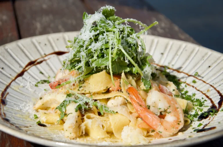 Seafood linguine with prawns, rocket and parmesan